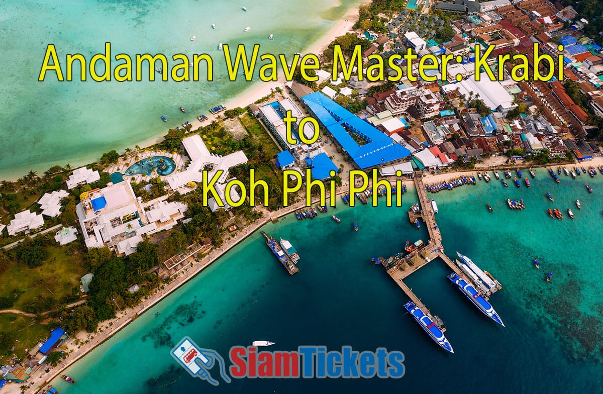 An aerial view of Tonsai Pier at Koh Phi Phi, showing two Andaman Wave Master ferries docked at the pier. The pier and surrounding buildings are visible, with clear turquoise water and boats in the harbor. The text "Andaman Wave Master: Krabi to Koh Phi Phi" is in yellow at the top center.